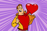 Valentine day, man in love with a red heart