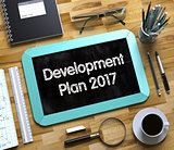 Development Plan 2017 on Small Chalkboard. 3D.