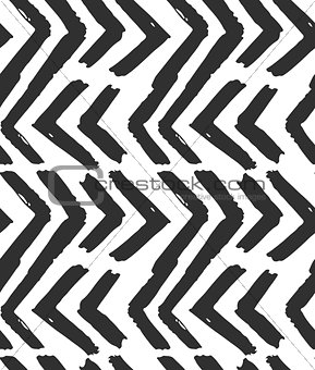 Hand drawn vector abstract rough geometric monochrome seamless zig zag chevron pattern in black and white colors.Hand made grunge brush painted texture.Scandinavian concept design for fashion,fabric.