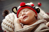 Little baby sleeping in Christmas costume