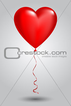 Red balloon in form of heart on light background
