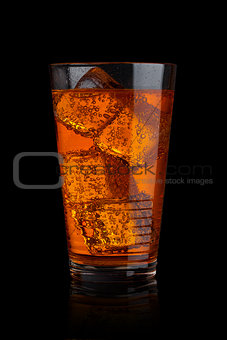 Glass of energy carbonated soda drink with ice