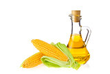 Decanter with farm organic vegetable oil and pair juicy corn cob