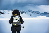 Traveler enjoying winter landscape
