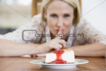 Woman Tempted By Cheesecake