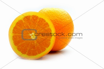 Half an orange with peel on and half segment without 