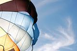 Parachute against blue sky
