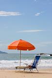 Chairs and parasol on beach