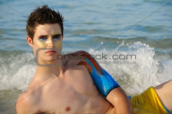 Young man on the beach