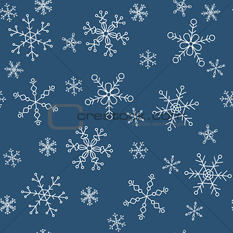Snowflakes of different styles on a background of blue, pattern