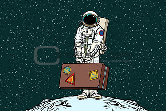 Astronaut traveler with travel suitcase