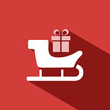 Sled icon with gift and shade on red background