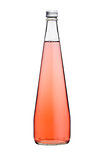 Glass bottle of sparkling pink soda lemonade