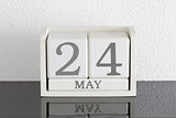 White block calendar present date 24 and month May