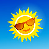 Cheerful, smiling cartoon sun in sunglasses on blue background.