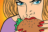Hungry woman eats Burger