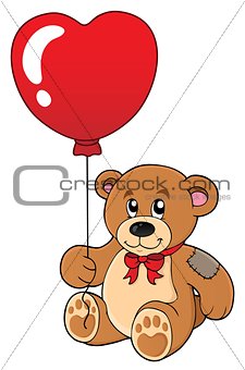 Teddy bear with heart shaped balloon