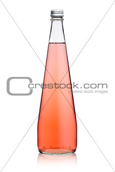 Glass bottle of sparkling pink soda lemonade