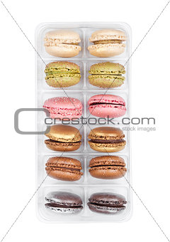 French colorful macarons dessert cakes in tray 