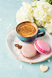 Cup of coffee and macaroons.