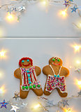 Male and Female Christmas Cookies with garland.