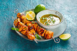 Chicken skewers with sauce