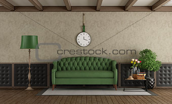 Classic living room with green sofa
