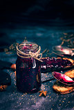 Raspberry jam in a glass jar 