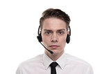 Close-up photo of young calm agent of call centre