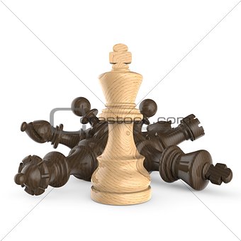 White wooden king standing over fallen wooden black chess pieces