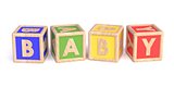 Word BABY made of wooden blocks toy horizontal 3D