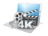 Laptop with film reels, movie clapper board and 4K video icon. 3