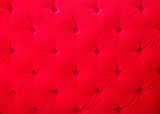 Red velvet fabric texture background pattern closeup