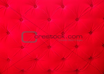 Red velvet fabric texture background pattern closeup
