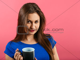Beautiful happy woman drinking coffee