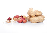 Raw peanuts with shell on white background