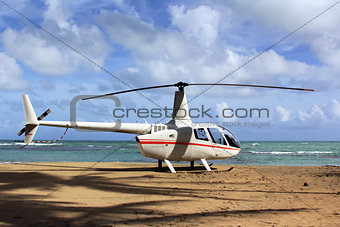 Small helicopter for excursions on a deserted beach