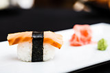 Smoked salmon sushi served on a plate