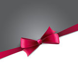 Red gift bows with ribbons.