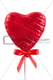 Red Chocolate love heart lollypop isolated