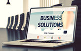 Business Solutions Concept on Laptop Screen. 3d