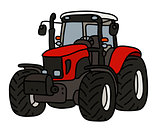 The red heavy tractor