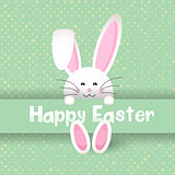 Cute Easter bunny on polka dot background 