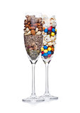 Popcorn and candies glass with healthy nuts glass
