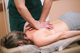 Alternative medicine - doctor osteopath have manual therapy for woman's back