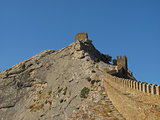 defensive Genoa wall on the mountain against the blue sky