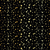 Repeating gold dotted background. Seamless pattern.