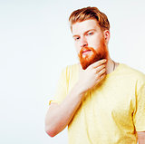 young handsome hipster ginger bearded guy looking brutal isolate