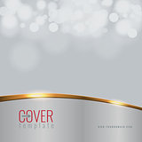 Vector Elegant business cover design background with golden line effect. Blur bokeh.