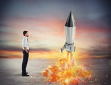 Startup of a new company with starting rocket. Concept of business growth